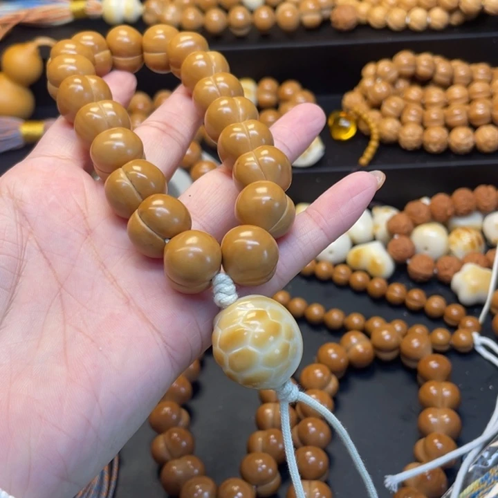 X***.猴头核桃吊坠微瑕屁桃手持