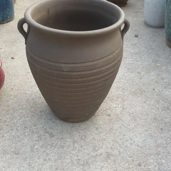 红陶口20高27瑕疵底部烧裂