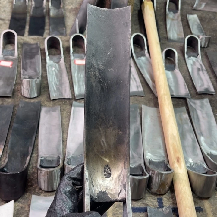希***橘龙泉手工制作工艺锄头炮管焊斧