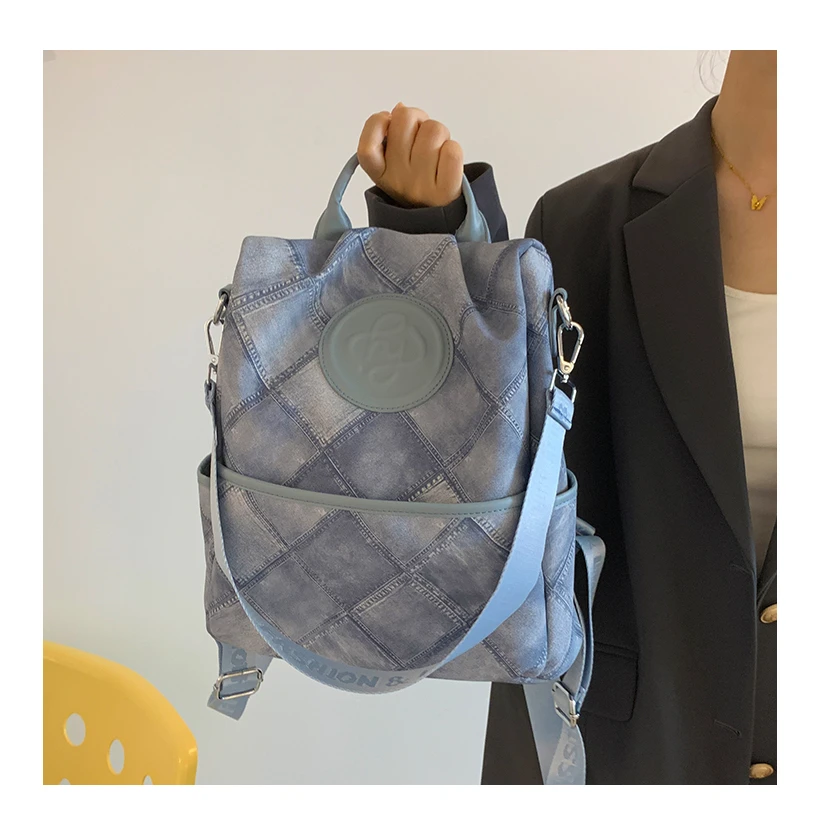 时尚新款大容量双肩包潮流通勤书包旅行大容量背包休闲简约5816