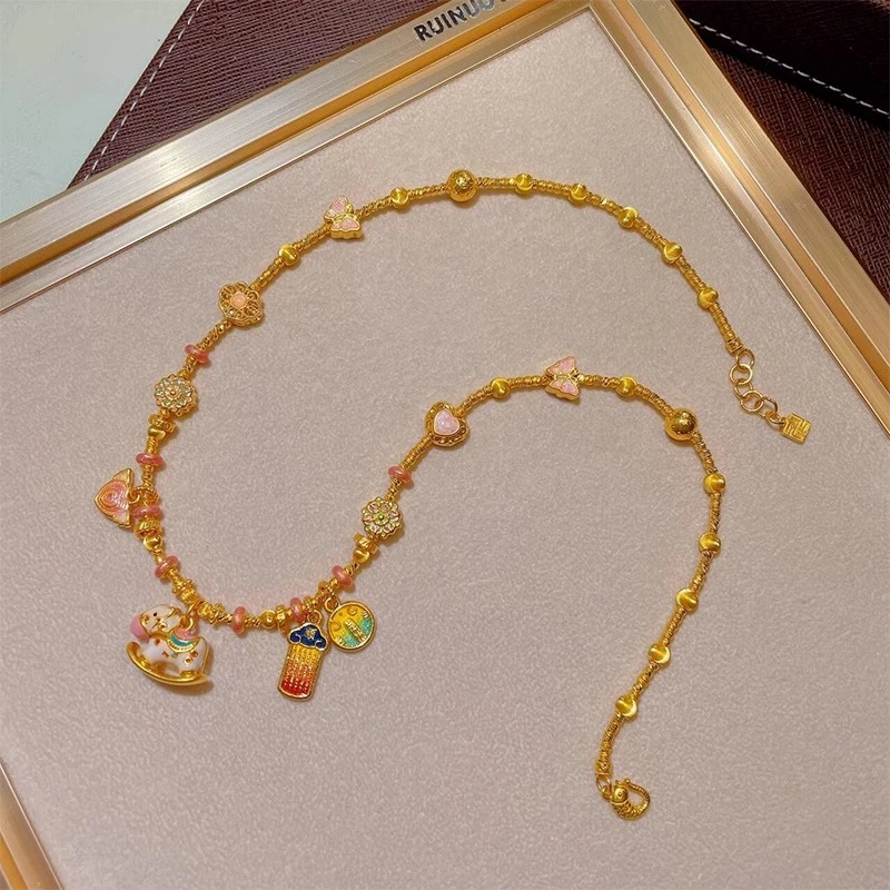 瑞诺黄金木马幻影珠项链女2025新款足金999小众设计生日礼物送女