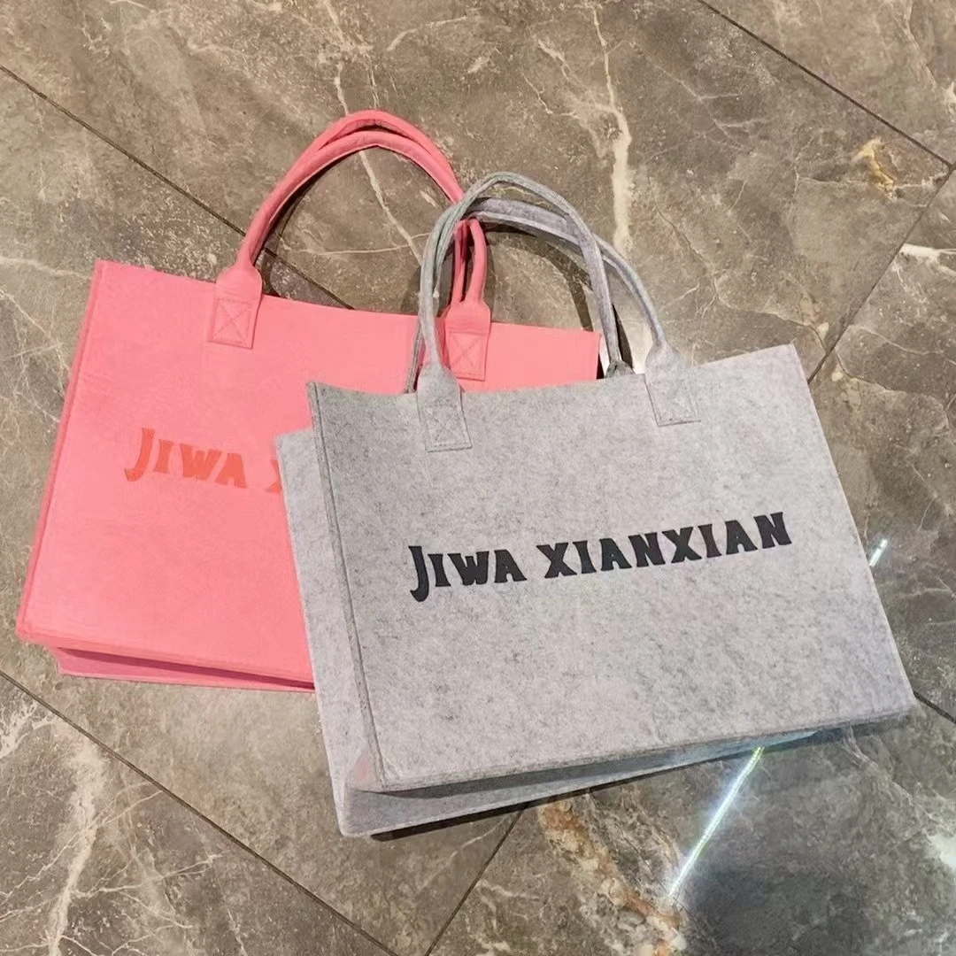 双根简约风手提款激光日式手提包斜跨百搭简约布包