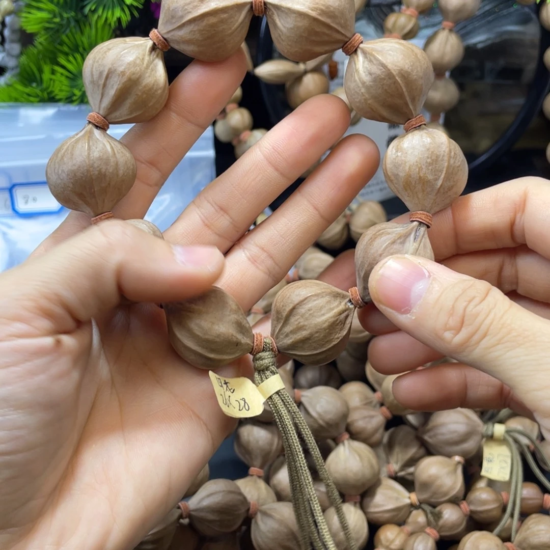 天***石橄榄核吊坠四花铁核2628