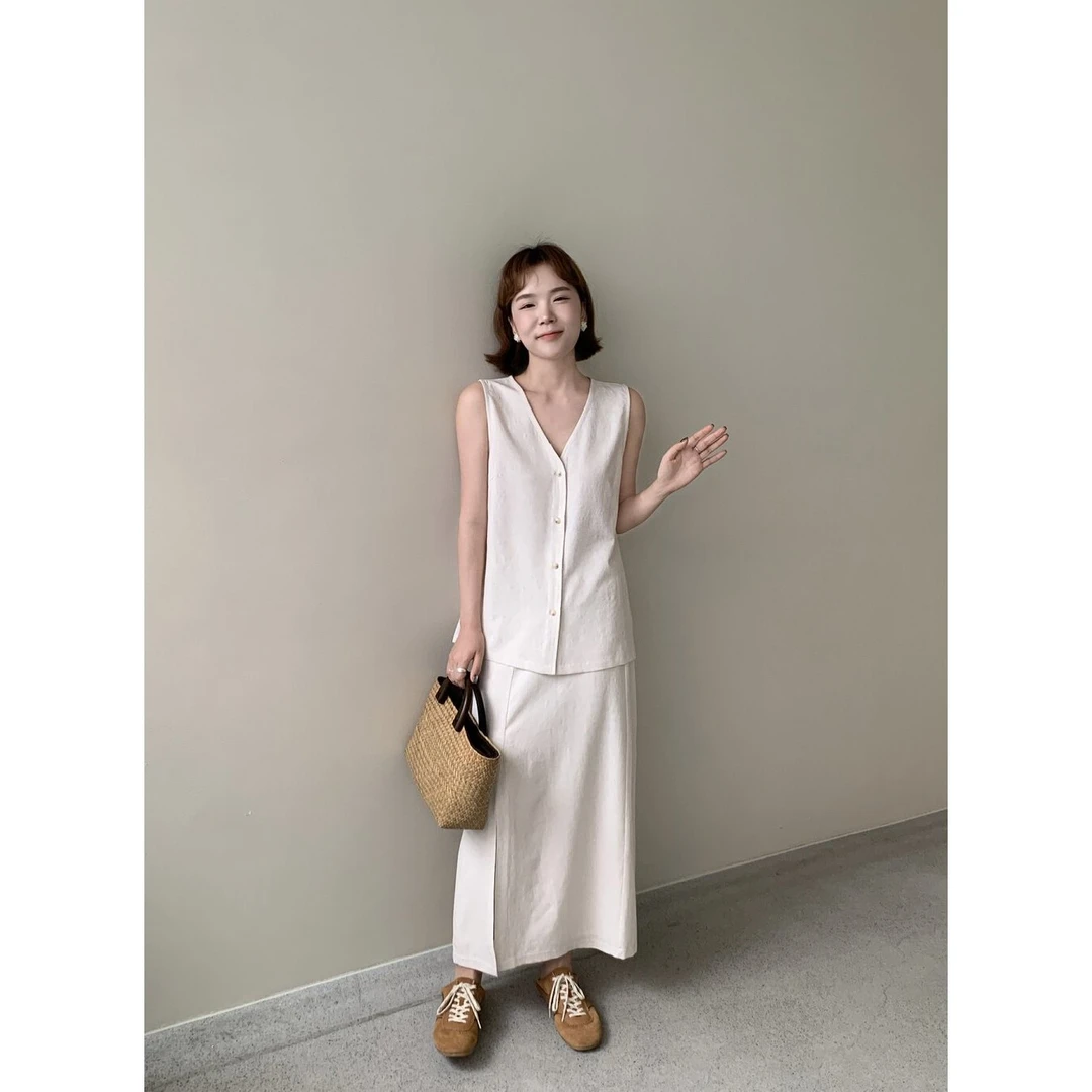 57152#(两件套)时尚气质背心+休闲垂感显瘦半身裙