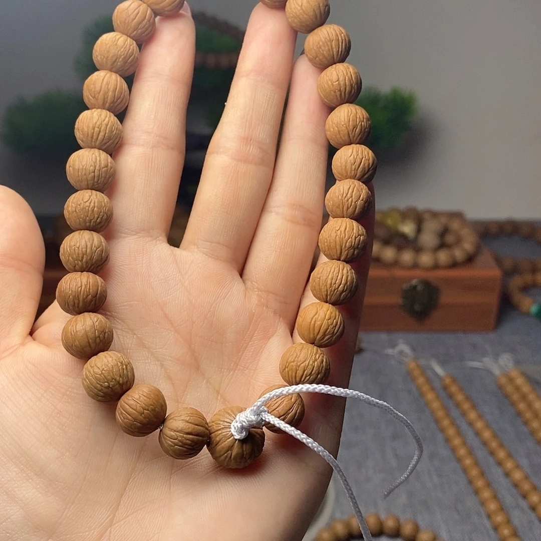 猴头核桃手串䒕**电11不同