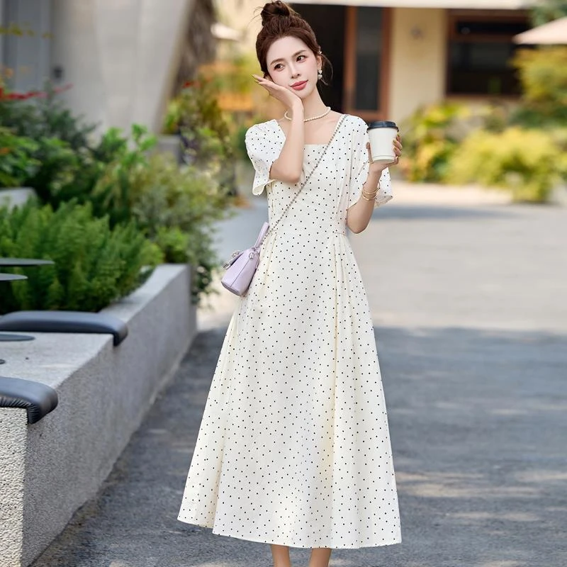 杭州高端时尚连衣裙女2025新款夏季国际大白色波点高端裙子