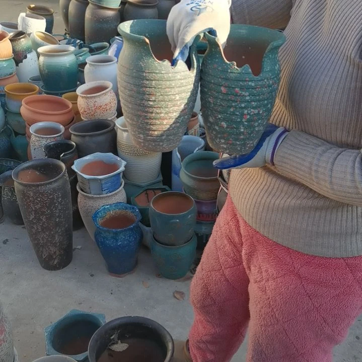 红陶口14高21瑕疵两”