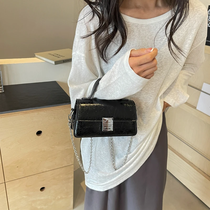 高级质感手提包包女2025新款百搭通勤小方包网红银色单肩斜挎包女