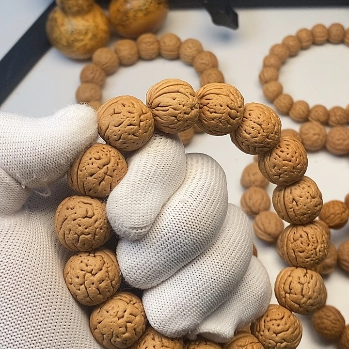 2***2桃核吊坠盘锦树王肌肉