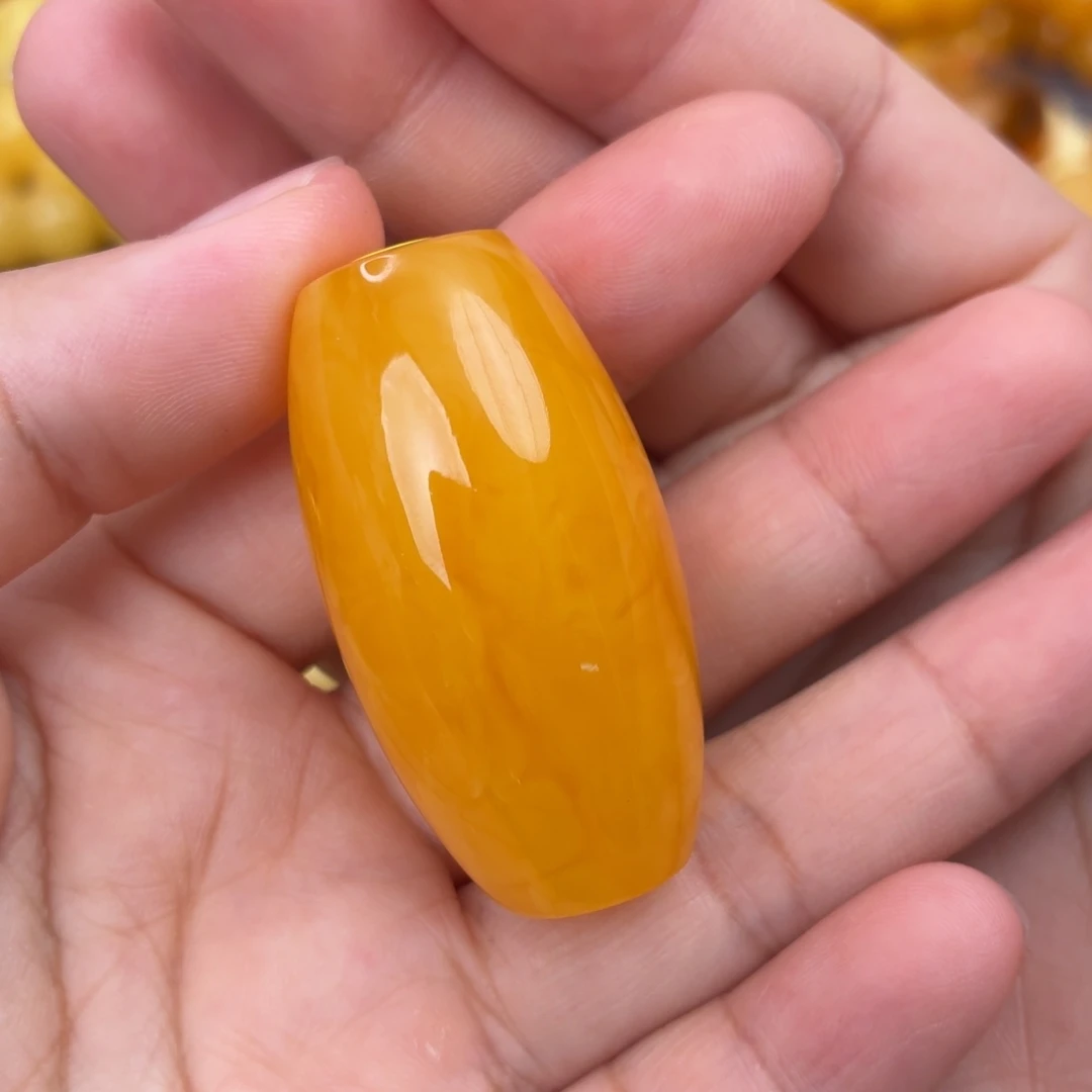 裸石琥珀未镶嵌橘红枣桶