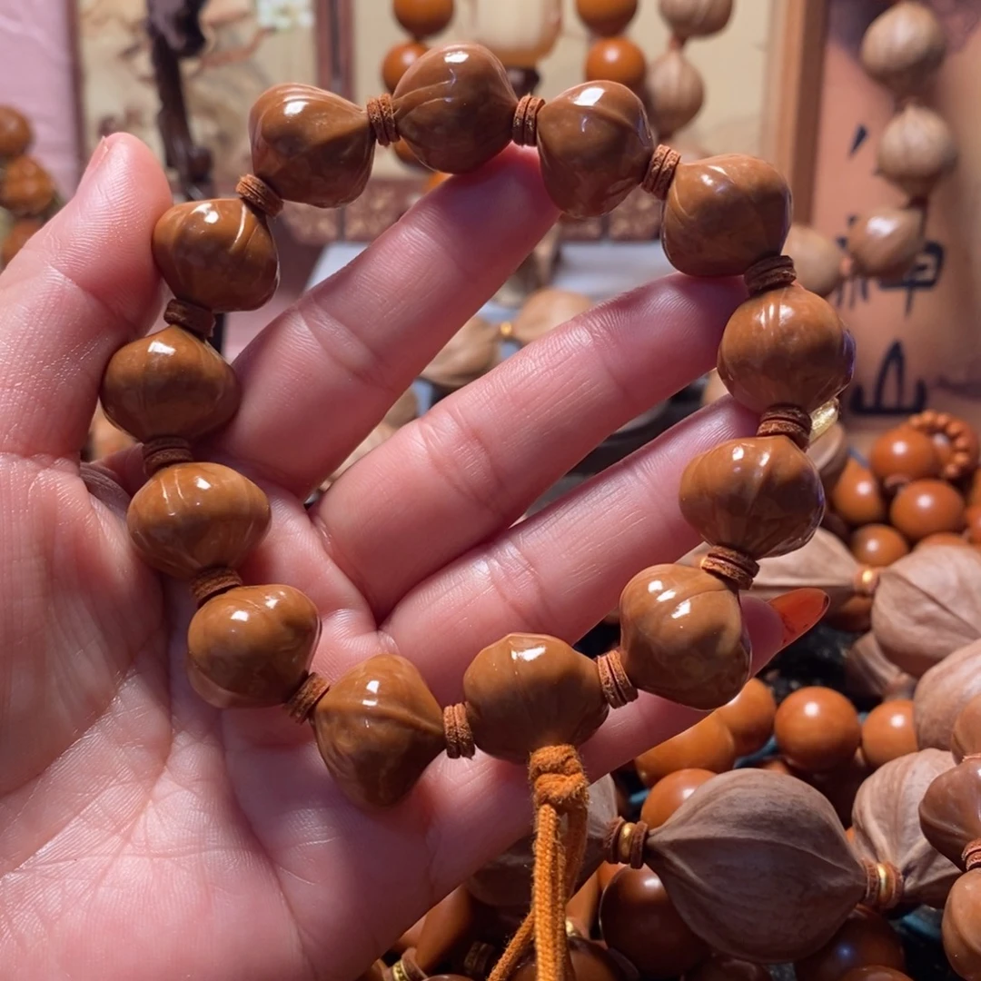 橄榄核手串/手链1.7蜜桃鸡血短