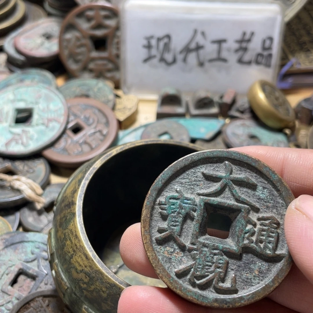 光***头铜现代工艺品学习币