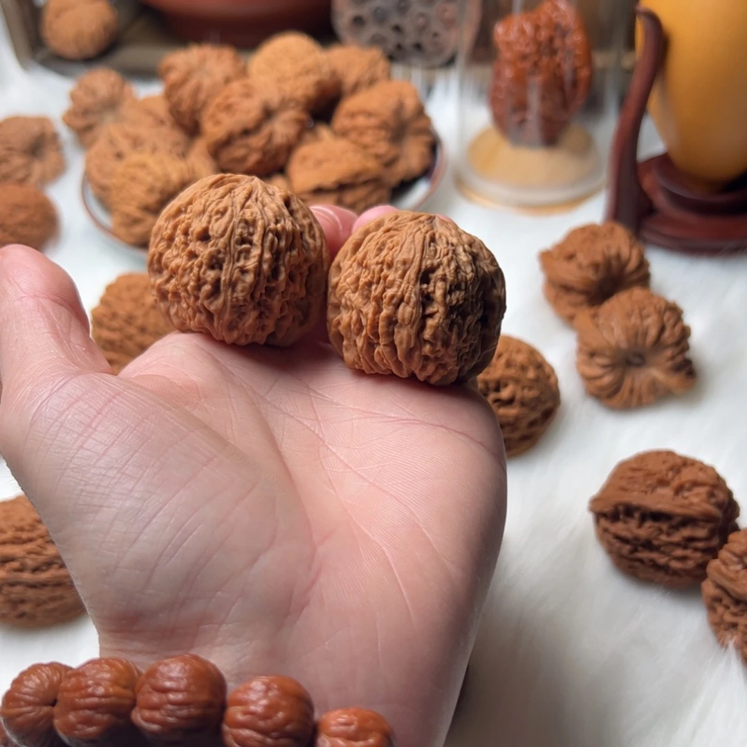 蛊***。吊坠文玩核桃拉丝凹底南将石