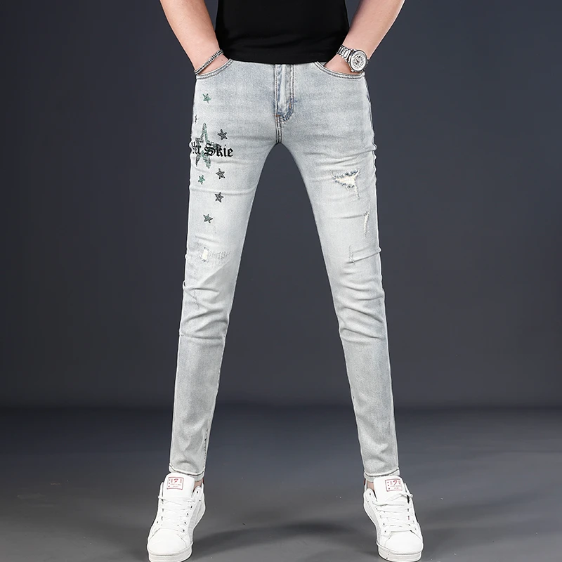 DESITASH春秋季浅蓝色破洞牛仔裤男士烫钻新款弹力修身小脚休闲裤