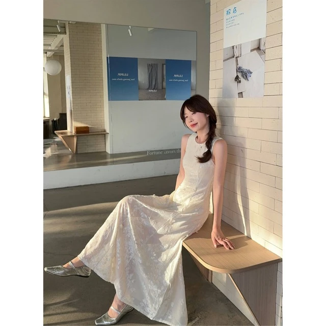 夏季今年流行爆款小众设计感收腰两穿裙子温柔风过膝背心连衣裙女