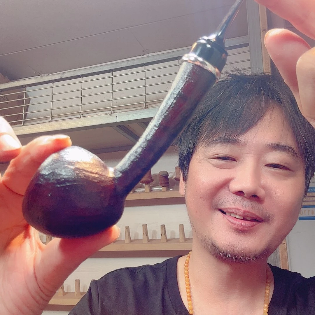 ?**”焦耀烟斗一长杆橡果