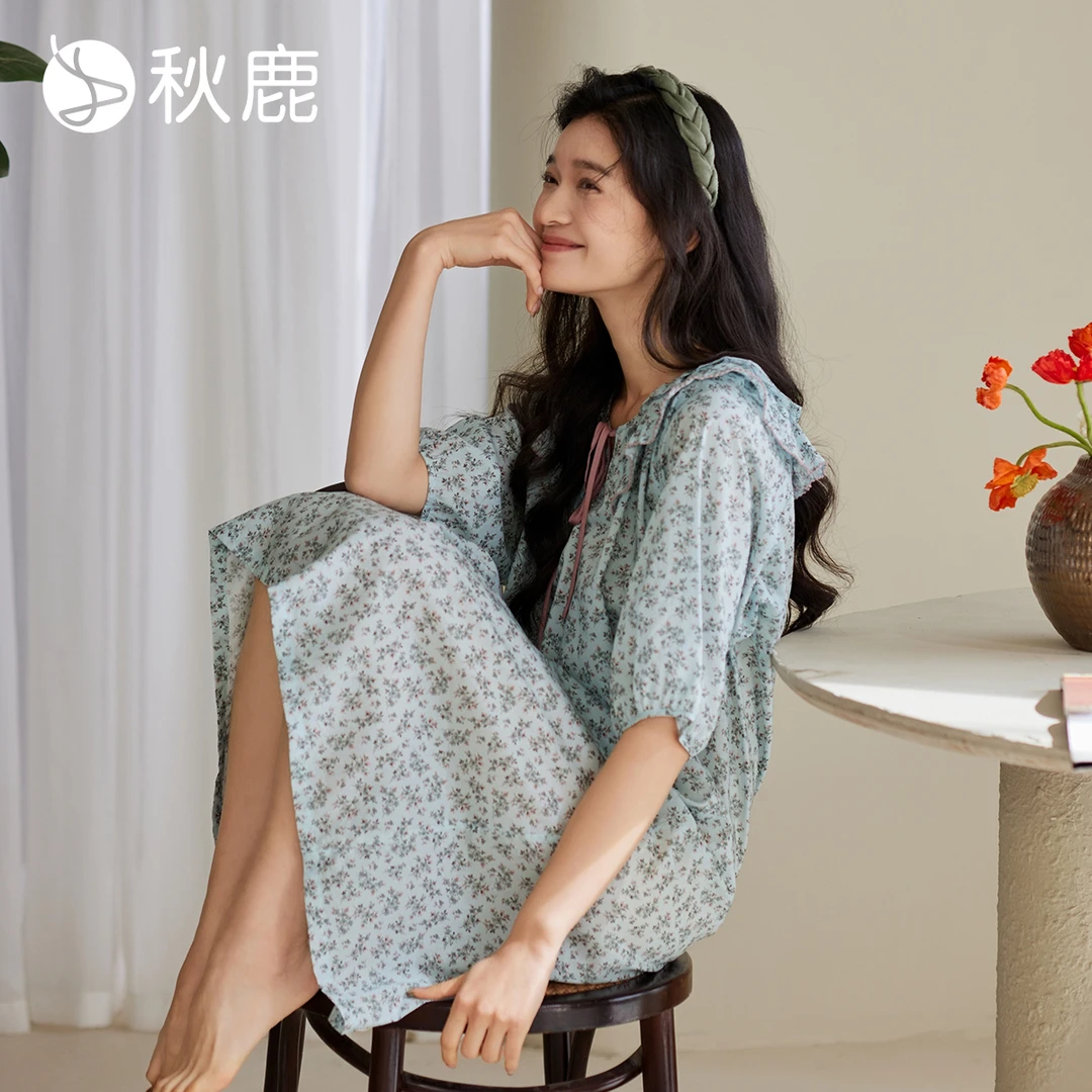 秋鹿梭织人棉抗菌印花圆领六分袖女裙