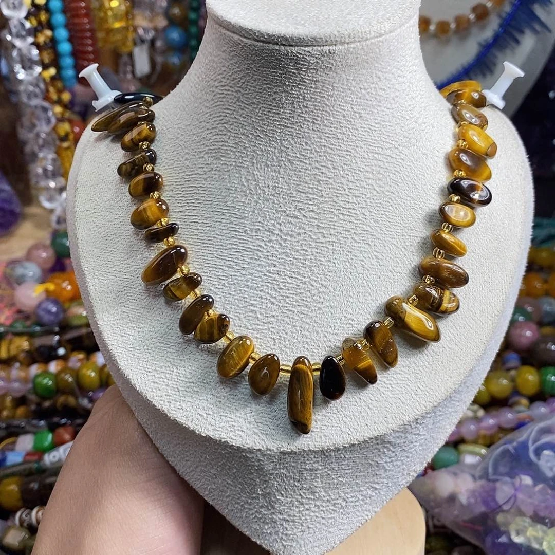 石英质玉未镶嵌，A品黄虎眼长牙一条，