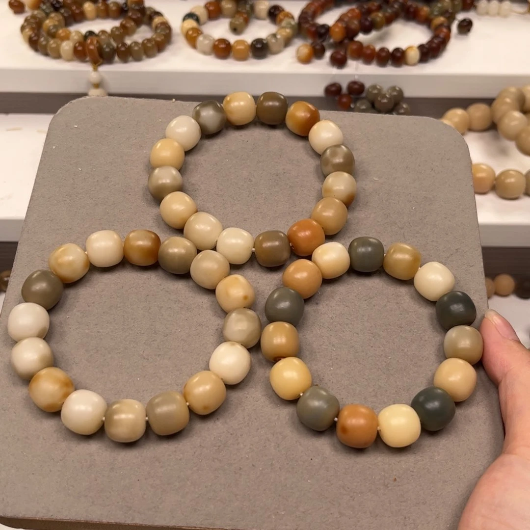 白玉菩提吊坠花皮干磨手串一条