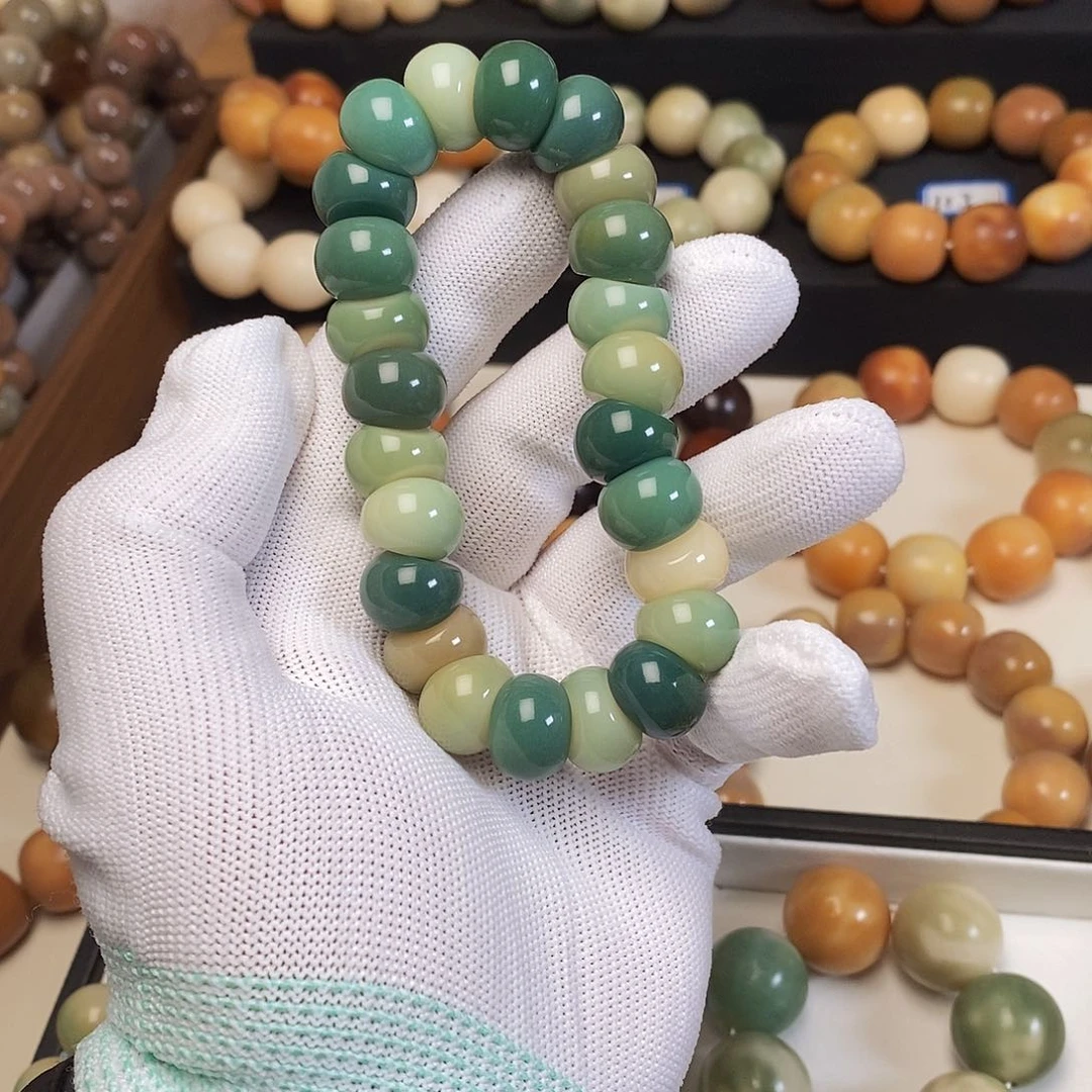 菩提根/象牙果手串?****卡14绿色蒜瓣大肠