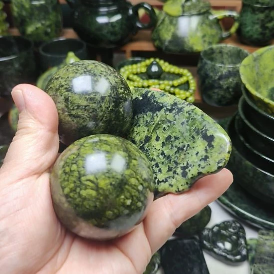 黄***绝蛇纹石玉未镶嵌手球大50