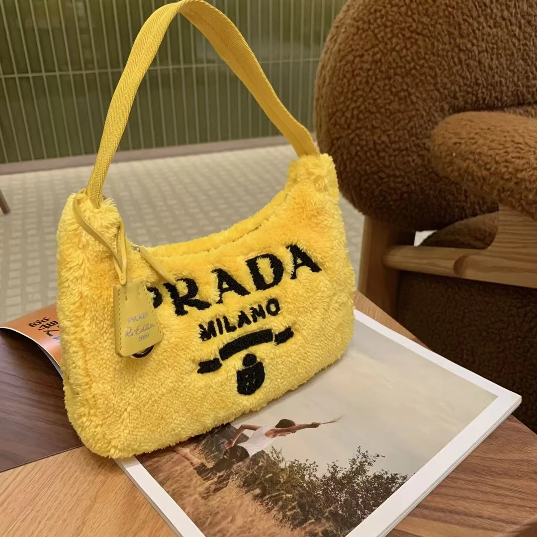 99新 Prada/普拉达 芒果黄泰迪hobo2000/66809969/12期/代卖服务