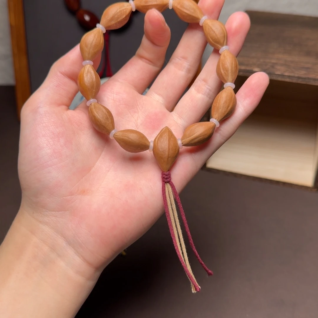 橄榄核吊坠哈哈哈哈哈哈哈哈哈