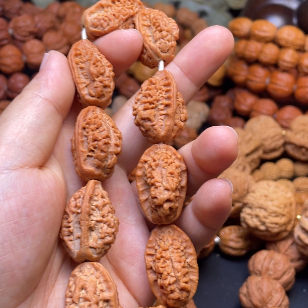 吉***一文玩核桃吊坠绣花鞋