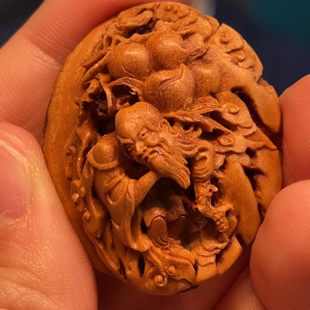 桃核东方朔核雕作品