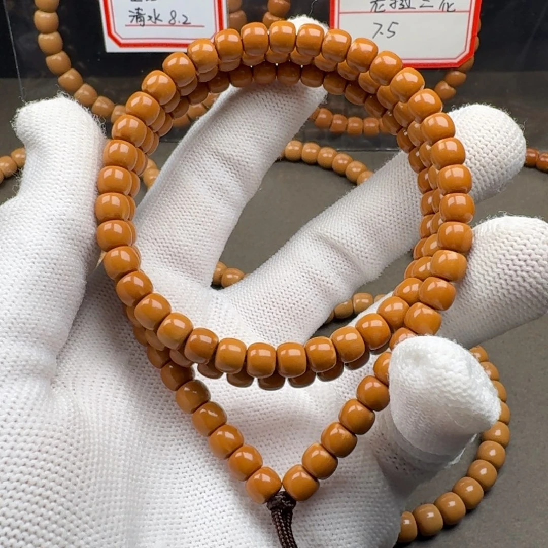 吊坠橄榄核老挝核尖长串5.9mm 微白