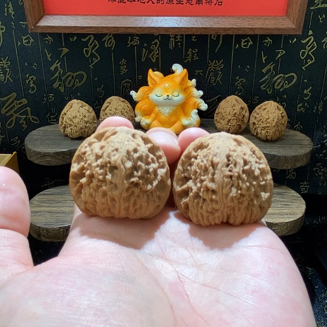 韩****文玩核桃把件涿鹿南将石