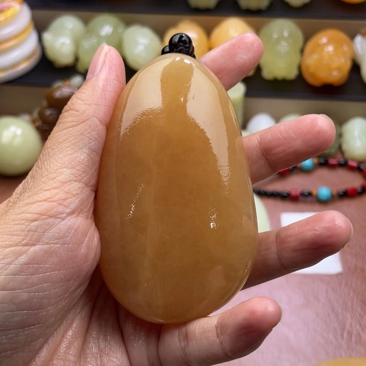 相***生石材古青石手把件