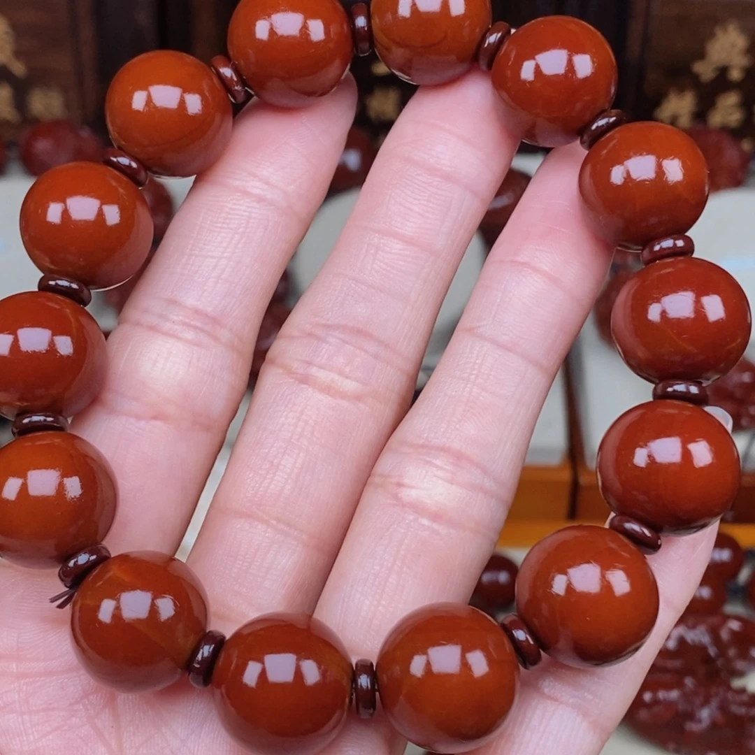 橄榄核手串南****儿光珠，