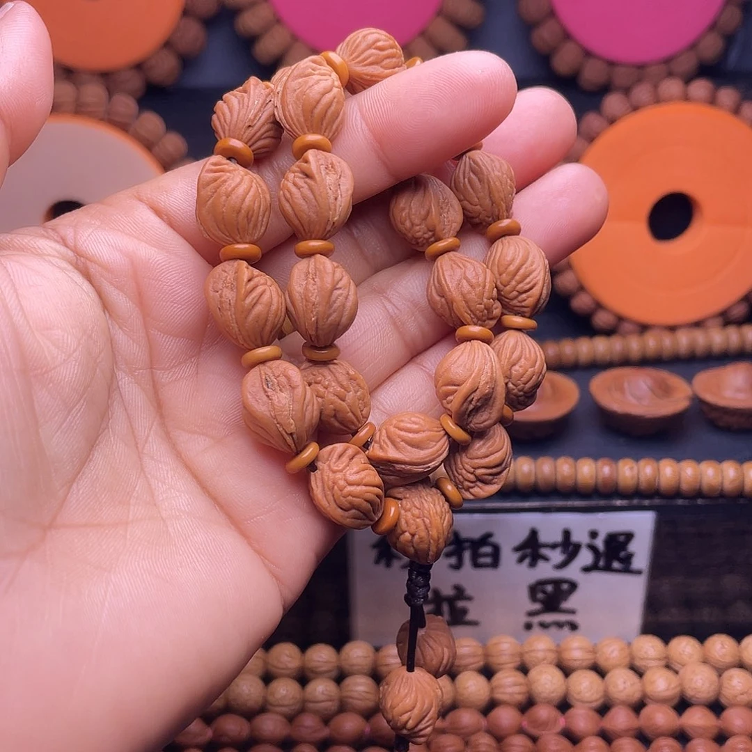 潜***阳吊坠桃核秦岭龙纹桃核生命手持24颗籽
