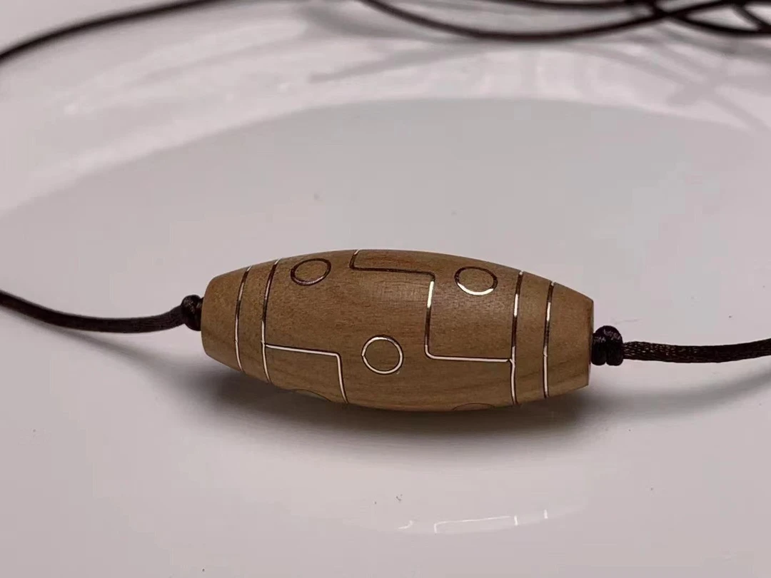 印度老山檀香阴沉镶嵌纯银丝九眼天珠