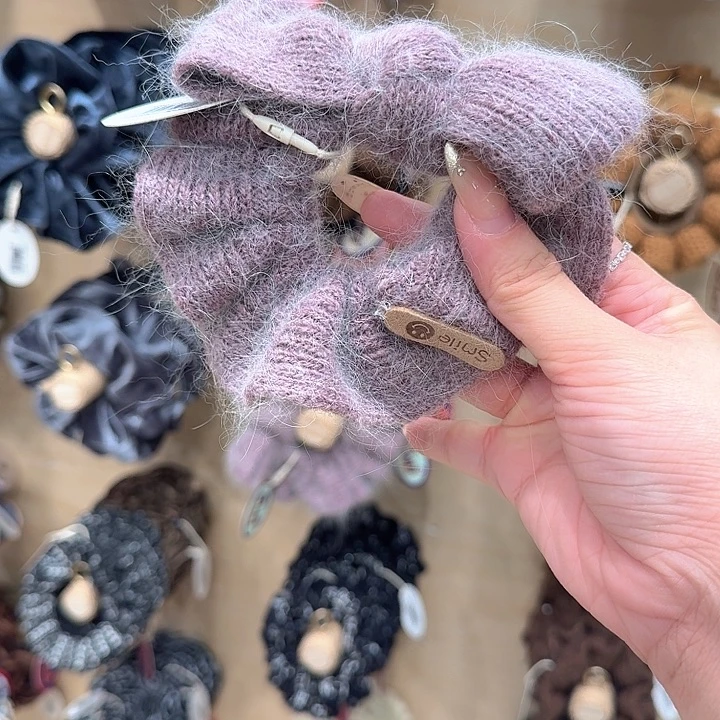 紫色蝴蝶结毛线发圈