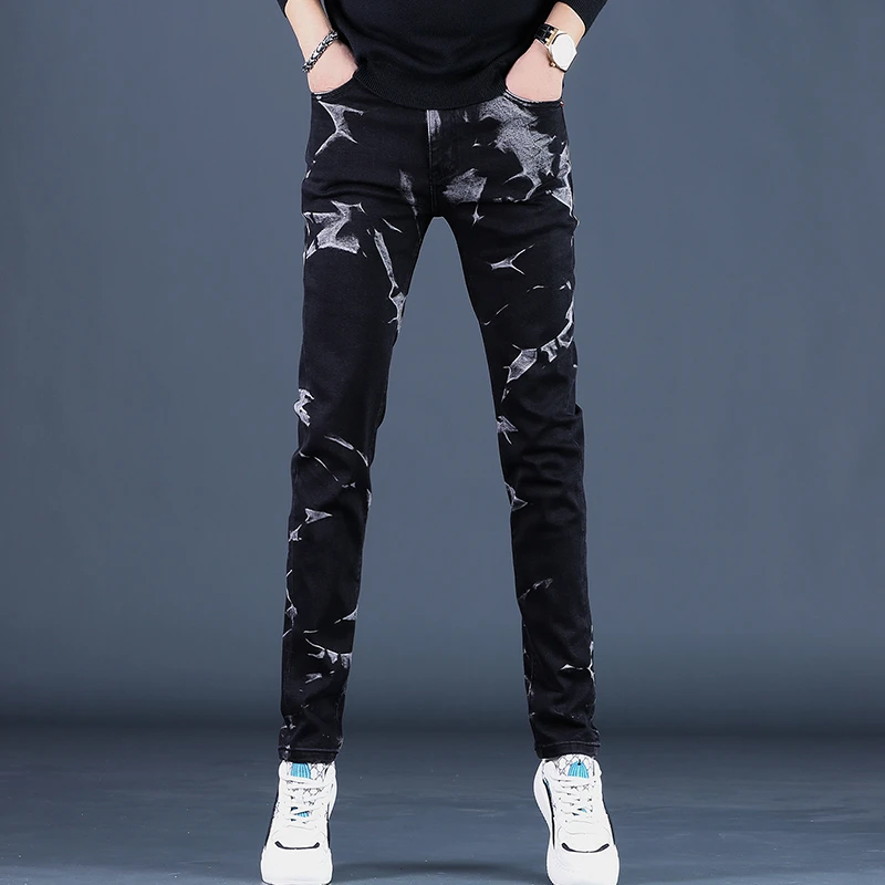 秋冬季新款欧洲站潮流时尚休闲花裤子男士修身不规则印花牛仔裤男