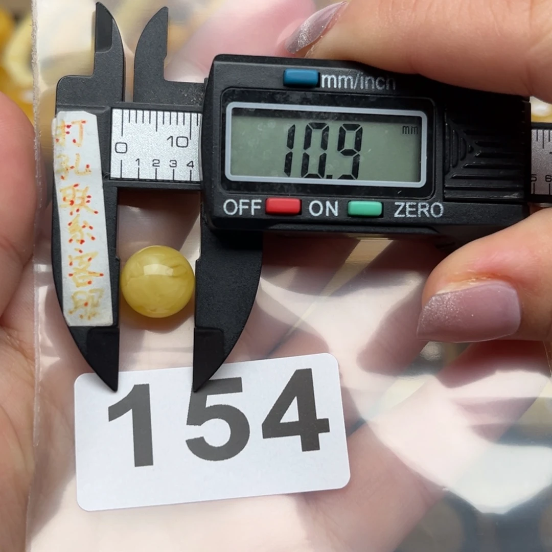 蜜蜡裸石未镶嵌欣***成蜜蜡