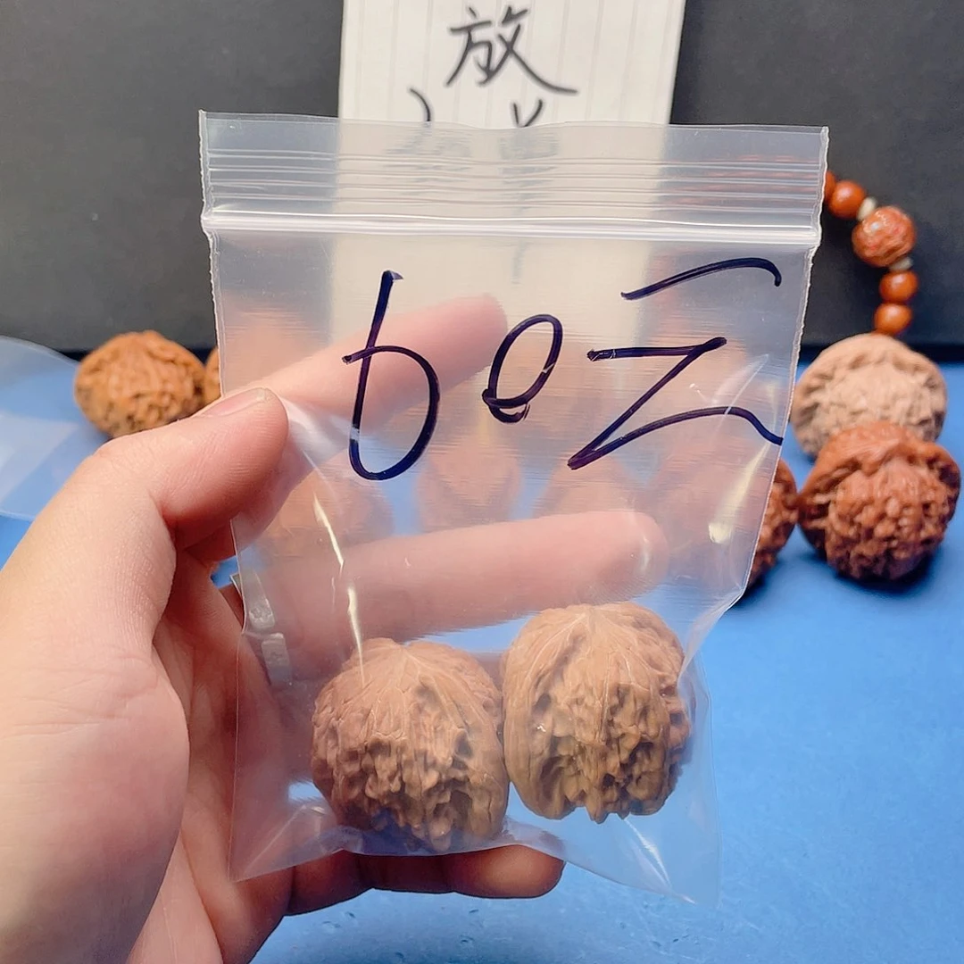 文玩核桃吊坠磨盘。58元