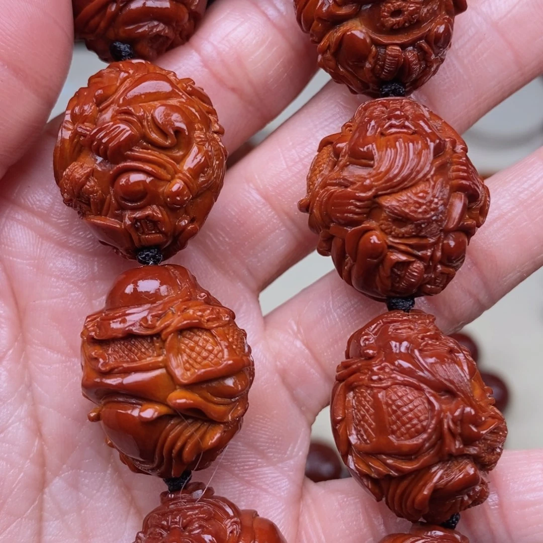 橄榄核把件B****t关公，