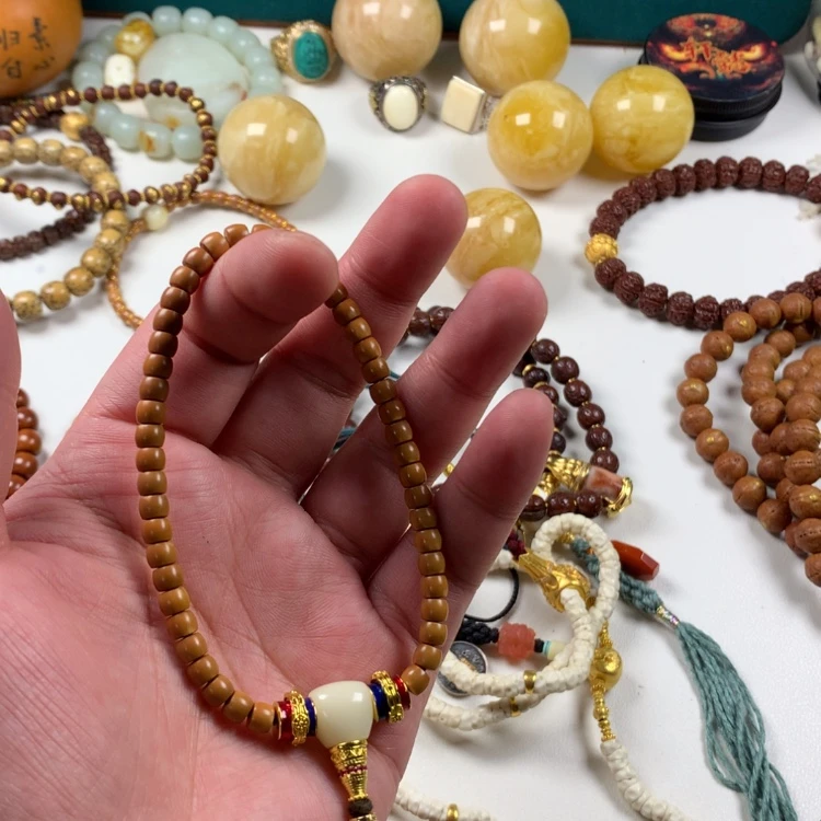 【闪购商品】橄榄核吊坠。。。。。。。。。。。。。