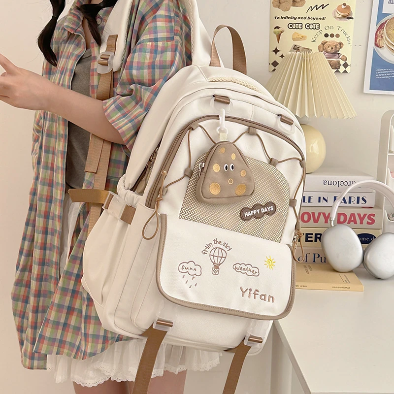 大容量书包女高颜值百搭高中大学生刺绣双肩包森系风可爱初中学生