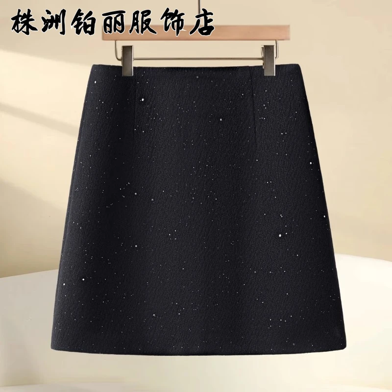 黑色亮片半身裙女春秋季2025新款高级感a字包臀裙显瘦毛呢短裙子