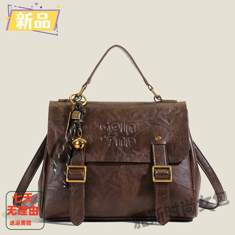 黑色潮流原创三用通勤斜挎手提英伦风邮差双肩包软皮公文剑桥包女