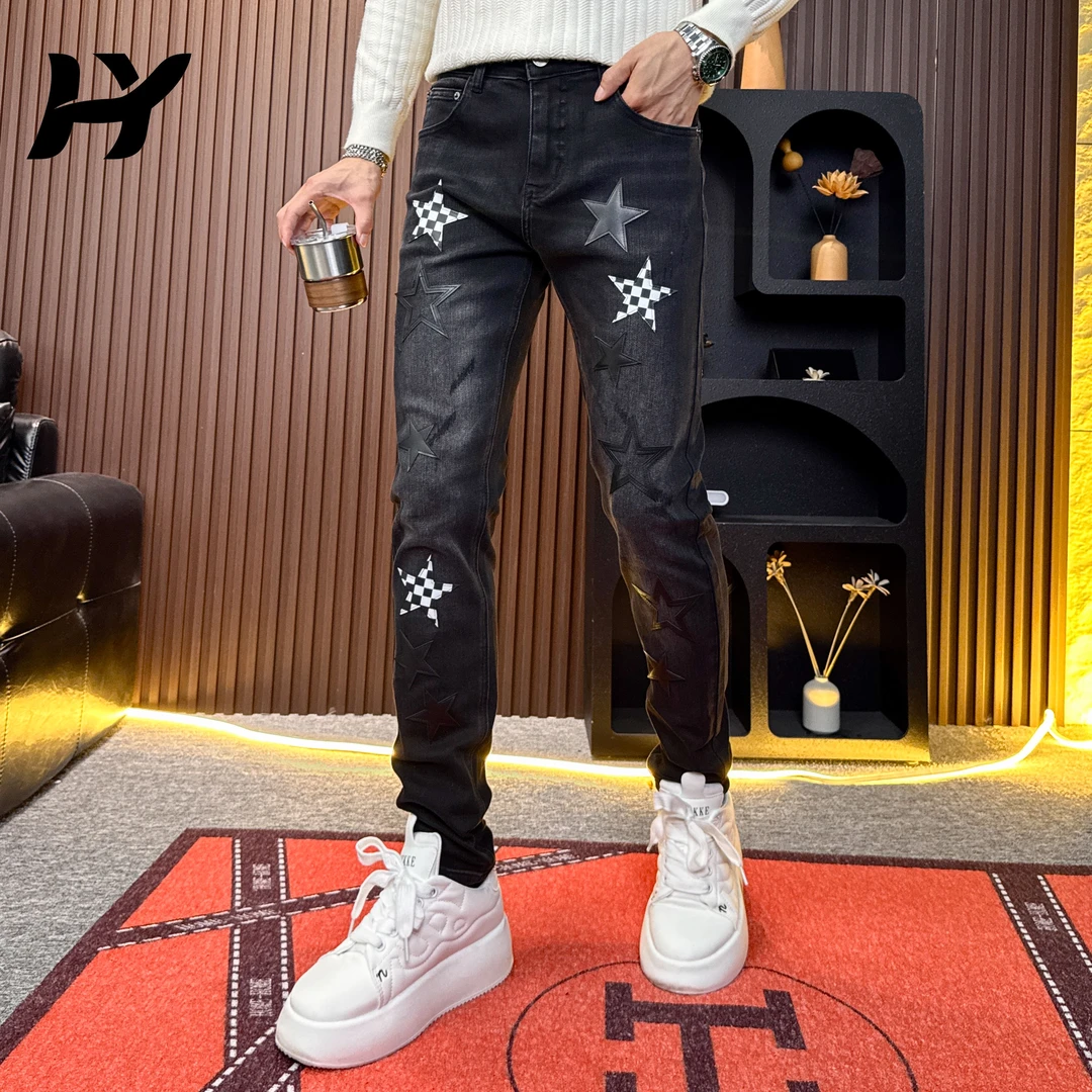 牛仔裤男款爆款2025新款高端黑色设计贴皮刺绣修身时尚小脚裤子男