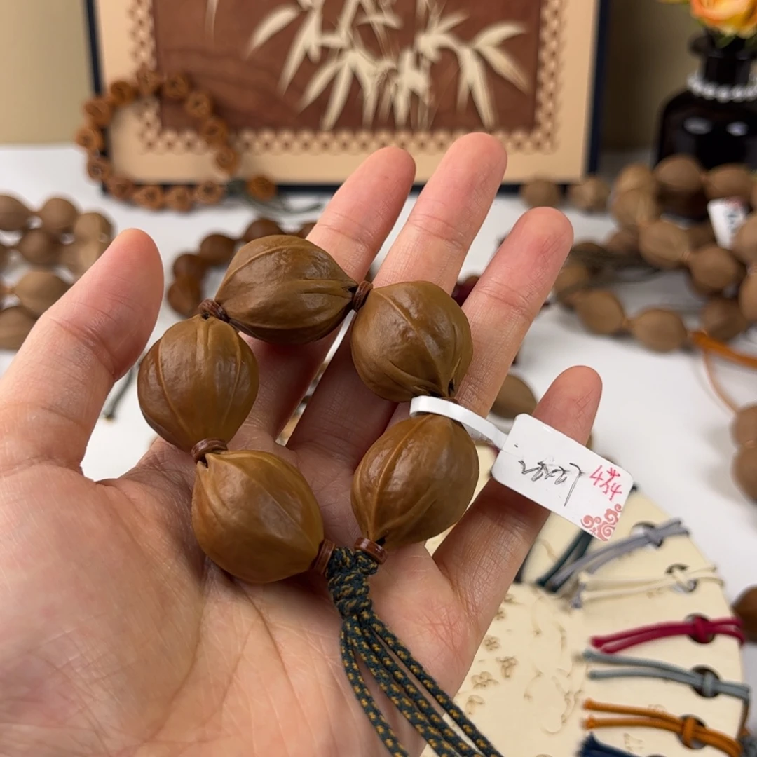 柠***胖橄榄核手串原生态梅林铁核2227