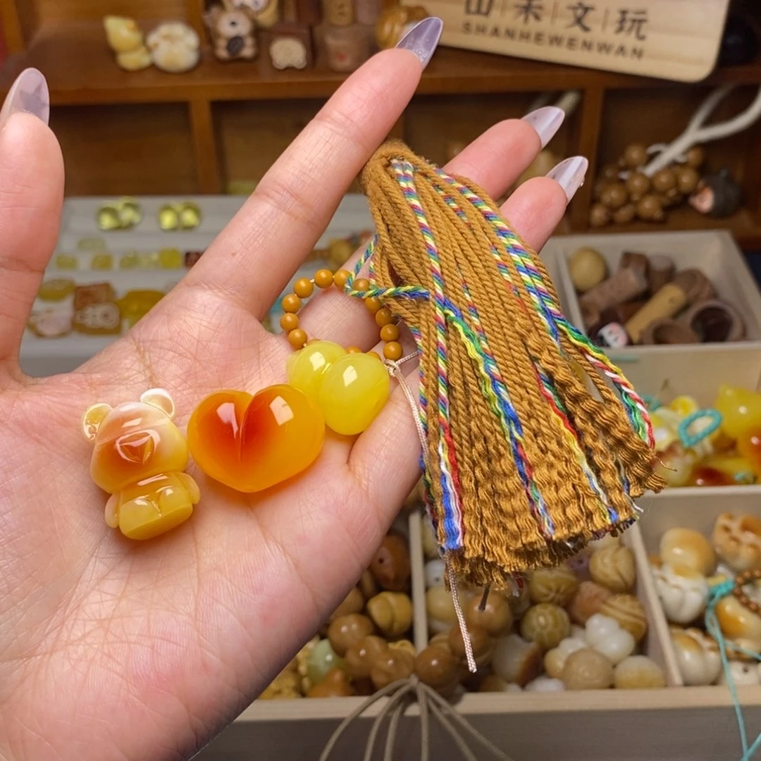 ****静猴头核桃吊坠小熊爱心葫芦棕跑棕流苏
