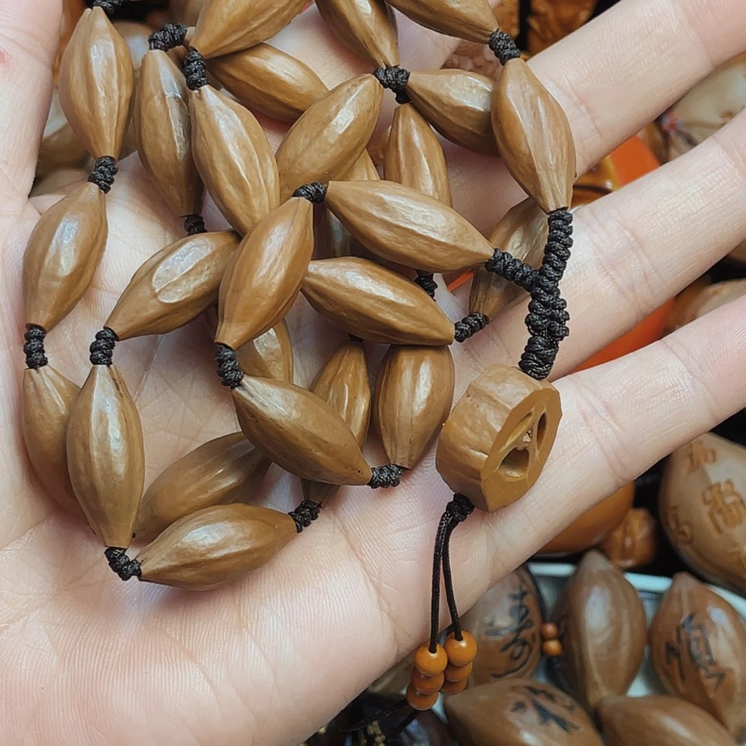 橄榄核吊坠老**H原皮素串