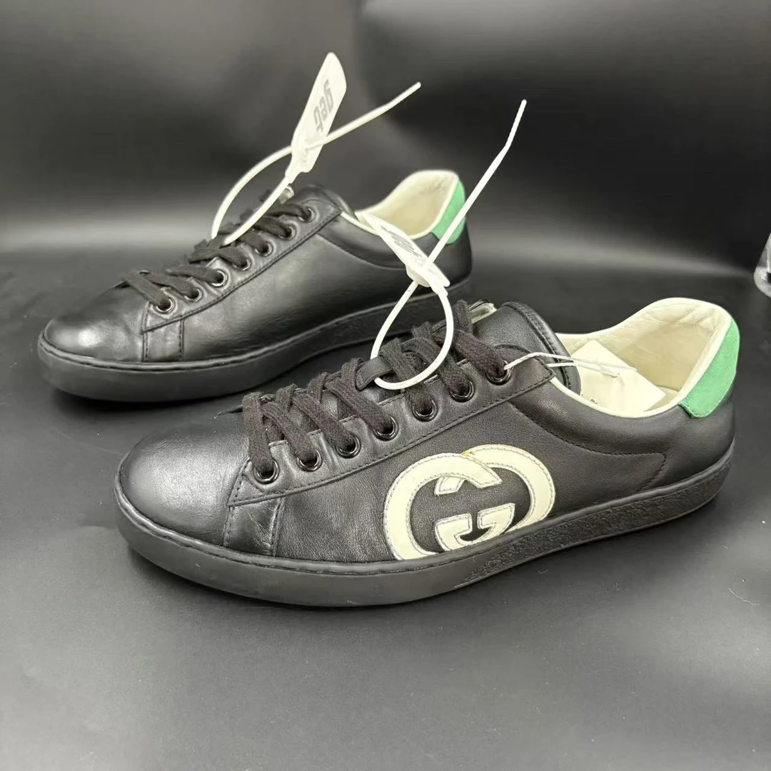 95新 GUCCI/古驰 时尚经典黑色双G互扣板鞋39.5欧码 los532