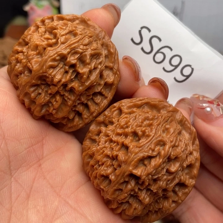 文玩核桃把件高炮红皮南疆44